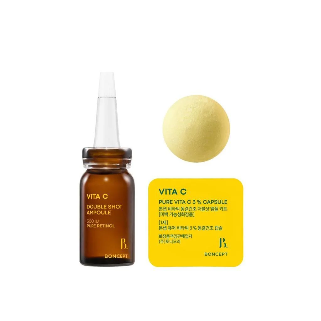 A Vita C Double Shot Ampoule in a brown bottle with a dropper, a yellow capsule, and accompanying yellow packaging with text, designed for skincare purposes.